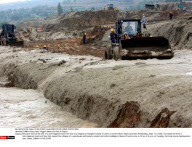 CHINA: Heavy Rain Triggers Mud-rock Flow In Shanxi