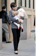 Actress KATIE HOLMES keeps SURI close after death threats