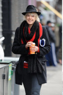 Model AGYNESS DEYN shows off her fuzzy two-tone Michael Kors scarf