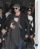 Brad Pitt and Angelina Jolie with family arriving at Narita International airport, Chiba, Japan - 27 Jan 2009