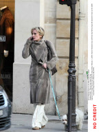 PARIS : Patricia Kaas walks her dog