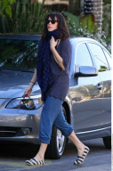 Actress LIV TYLER dons trendy striped canvas loafers