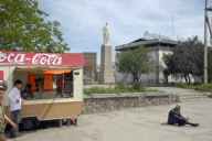 Coca Cola, beggar and Lenin