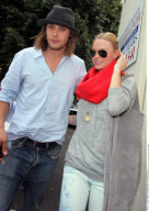 Actress KATE BOSWORTH shows off her bleached jeans with beau JAMES