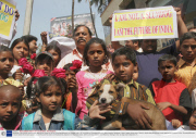 Residents of the Dharavi 'slum' protest against the makers of the film 'Slumdog Millionaire' in Mumbai, India - 03 Feb 2009
