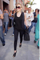 Vest-wearing actress HILARY DUFF gets a bit of police help