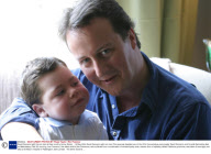 David Cameron with his son Ivan at their country home, Britain  - 16 May 2004