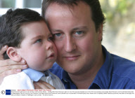 David Cameron with his son Ivan at their country home, Britain  - 16 May 2004