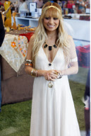 Pregnant NICOLE RICHIE dressed like Grecian goddess while launching her jewelery collection in Beverly Hills