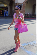 UK glam model KATIE PRICE shows off her pink Classic Cardy Ugg boots