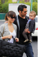 Actress JESSICA ALBA having a fit of laughter with hubby CASH WARREN and baby HONOR while leaving 'Bristol Farms' after grocery shopping