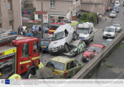 Nissan Terrano Ends Up on Top of Police Car During a Chase in Swansea, Wales, Britain - 14 Apr 2009