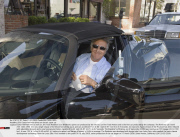 USA: Dustin Hoffman drives an electric sport car