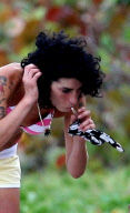 Amy Winehouse smokes something suspicious EXCLUSIVE
