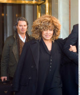 Singer TINA TURNER is leaving her hotel linked to a mysterious man while boyfriend ERWIN BACH is following