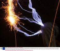The Thinker posed by Peter Terren with electricity from a Tesla coil, Bunbury, Western Australia - Apr 2009