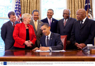 President Barack Obama signs the Civil Rights History Project Act bill in the Oval Office of the White House, Washington DC, America - 12 May 2009