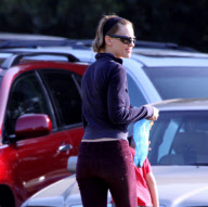 EXCLUSIVE Hilary Swank cleans after her dog, gives the dog Smart Water