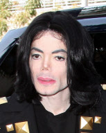 Michael Jackson with his masked kids in Beverly Hills
