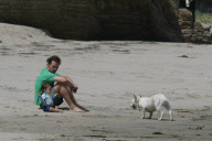 Matthew Mcconaughey having a sweet time with his son and his dog on Malibu beach 

