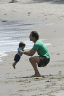 Matthew Mcconaughey having a sweet time with his son and his dog on Malibu beach 

