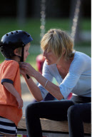 SHARON STONE with messy hair and without make up playing with her sons at Coldwater Canyon Park