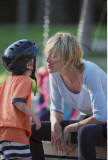 SHARON STONE with messy hair and without make up playing with her sons at Coldwater Canyon Park