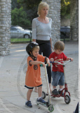 SHARON STONE with messy hair and without make up playing with her sons at Coldwater Canyon Park