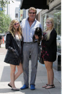 Actor DAVID HASSELHOFF with his daughters HAYLEY and TAYLOR ANN posing for the paparazzi