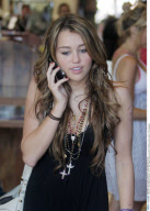 Teen singer and actress MILEY CYRUS and her mother TISH shopping