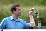 PROFESSOR KEVIN WARWICK AND HIS CYBERNETIC ARM AT READING UNIVERSITY, BRITAIN - 2002