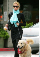 Hottie actress NICOLLETTE SHERIDAN and her dog Oliver shopping