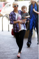 Singer CHRISTINA AGUILERA and son MAX having a splash at 'Color Me Mine' in Los Angeles