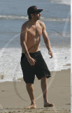 Actor DAVID DUCHOVNY shows off his hot beach body while having a family day out on Malibu beach