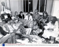 The Beatles With Maharishi Mahesh Yogi In 1967. The Beatles Paul Mccartney On The Sofa John Lennon Sitting On The Floor Besides The Sofa Ringo Starr Behind John Lennon And George Harrison Next To The Yogi.