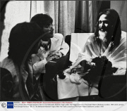 John Lennon And George Harrison Talk To The Maharishi Mahesh Yogi''s After His Public Lecture In The Hotel Hilton''s Ballroom London. 1967