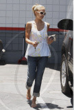 Actress JESSICA ALBA with scabs on her neck spotted shopping for new sunglasses in Los Angeles