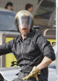 A female fan went nuts as she saw BRAD PITT with the golden helmet on his custom made motorbike cruising in Los Angeles