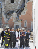 L'AQUILA: Carla Bruni Sarkozy visits the site of a recent earthquake