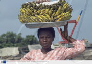 Vendors carrying unusual goods for sale on their heads, Ghana, West Africa  - Mar 2007