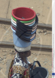 Vendors carrying unusual goods for sale on their heads, Ghana, West Africa  - Mar 2007