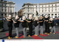 Oxfam Activists Highlighting Health and Education Issues During the G8 Summit, Rome, Italy - 10 Jul 2009