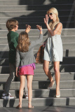 High fives all around for Paris Hilton