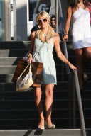 High fives all around for Paris Hilton