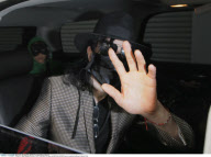 Grey hair? 50-year-old MICHAEL JACKSON exits a medical building in Beverly Hills
