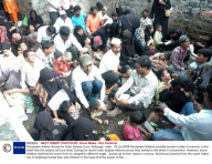 Paralysed children Buried for Solar Eclipse Cure, Gulbarga, India - 22 Jul 2009