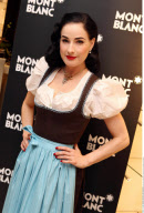 Burlesque beauty DITA VAN TEESE dons a traditional Dirndl at the MontBlanc store in Salzburg