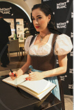 Burlesque beauty DITA VAN TEESE dons a traditional Dirndl at the MontBlanc store in Salzburg