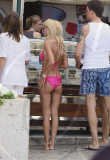 Tara Reid buys a sandwich for breakfast in St Tropez.