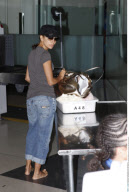 Actress EVA LONGORIA PARKER going to at a security check point at LAX airport
